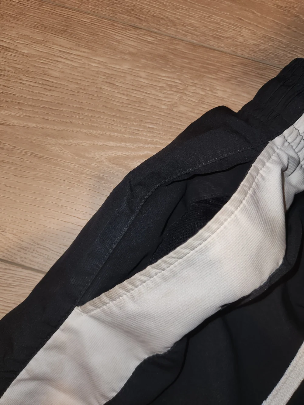 Nike Men's Black Shorts with White Side Stripe